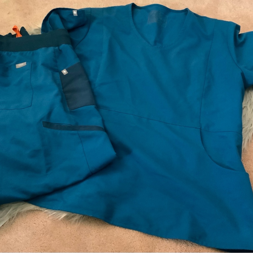 Figs special edition jogger and Odessa slimming scrub set set in maybe Carribean